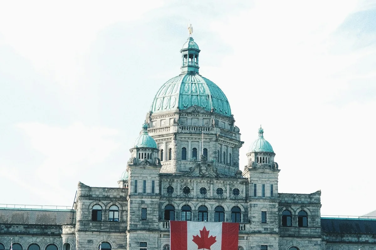 Canadian government building with national flag
