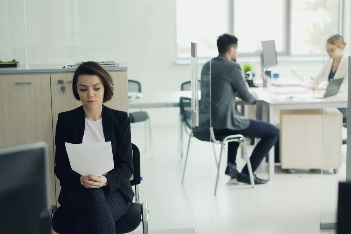 Business owner reviewing holding company papers
