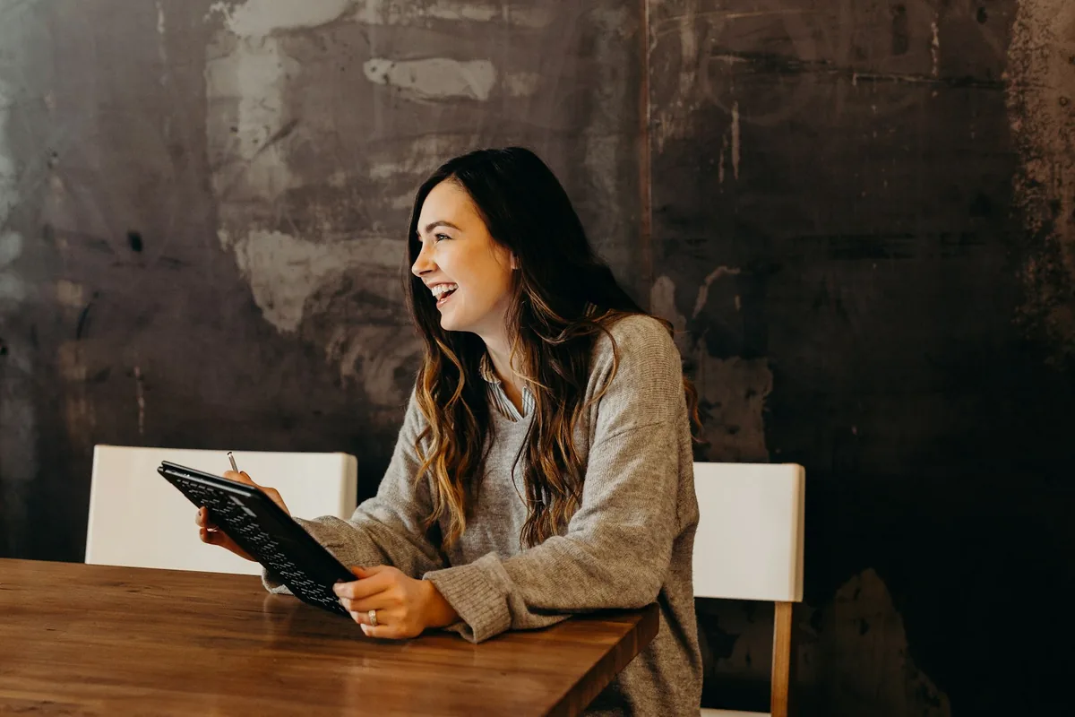 Business owner reviewing records on a tablet