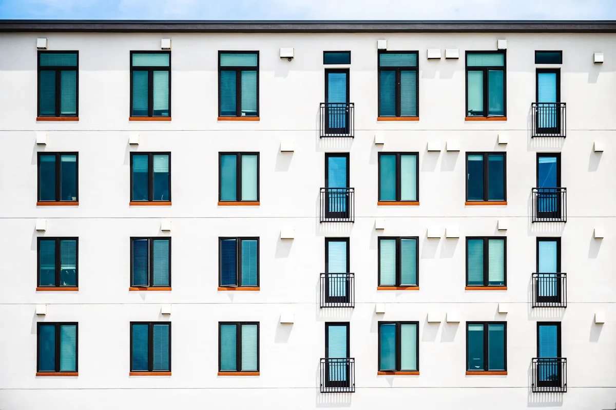 Modern apartment building kept as a Canadian rental property