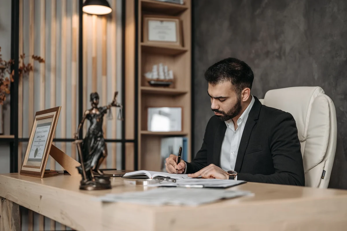 Legal professional reviewing documents for an estate file