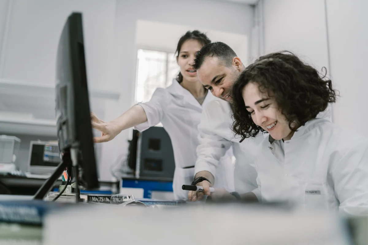 Research team collaborating in a modern laboratory