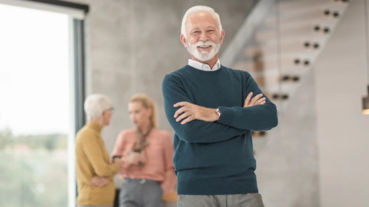Senior business owner in his office planning an estate freeze for succession