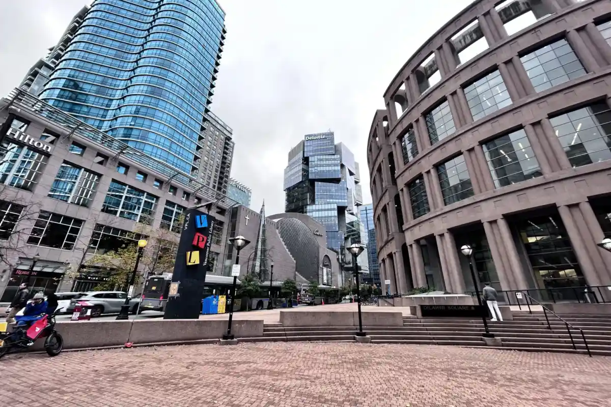 Downtown commercial buildings, representing a partnership growing into a corporation